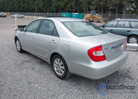 2003 Toyota Camry Xle z USA, uszkodzony, nr VIN 4T1BE32K53U786106